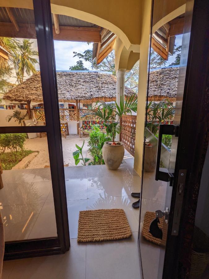 Mkadi Beach House Hotel Nungwi Exterior photo